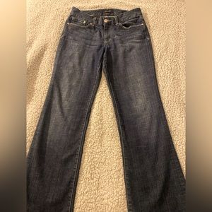 SEVEN7 dark washed jeans.